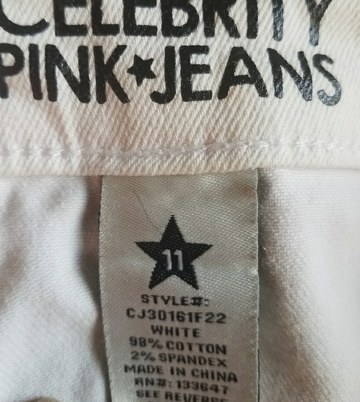 Wow them in these trendy white shorts! - Picture 3 of 3